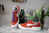 bape mad sta red blue shoes on marble table