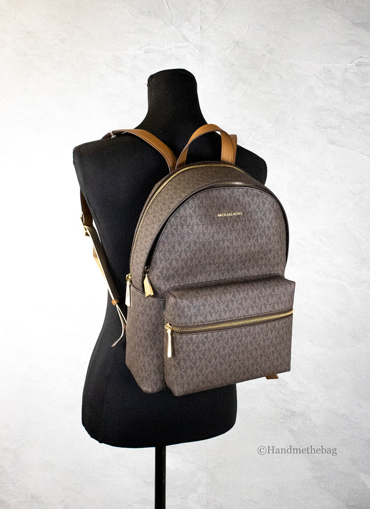 michael kors sally brown backpack on mannequin