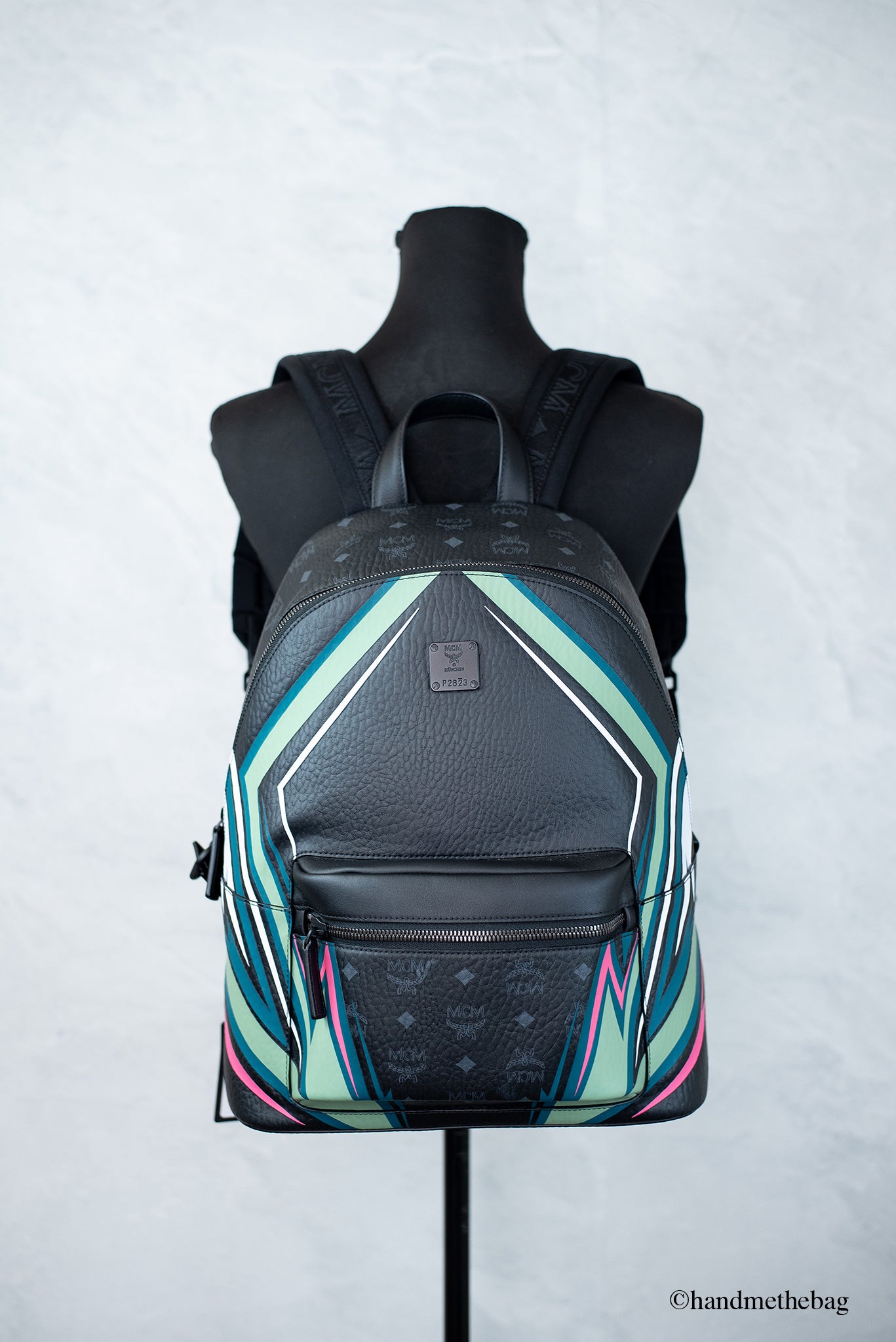 Mcm black medium online backpack