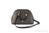 coach katy brown black dome satchel with strap on white background