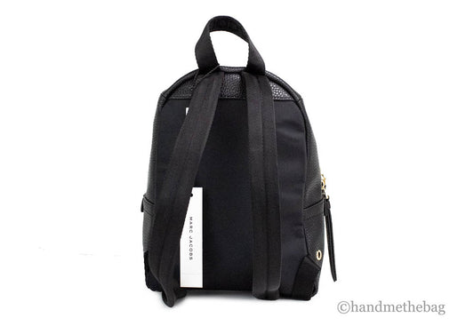 marc jacobs mini black backpack back on white background