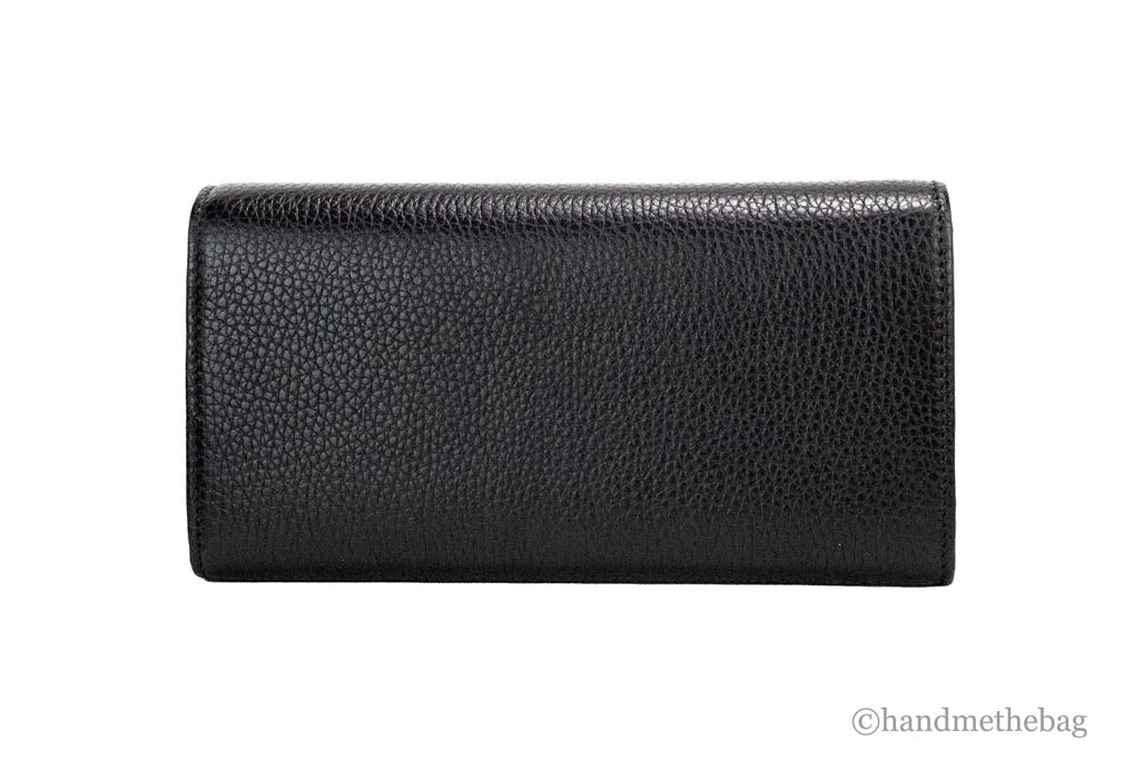 gucci cellarius snap clutch wallet back on white background