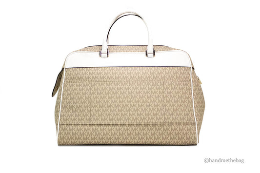 michael kors travel light cream patches duffle back on white background