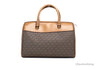 michael kors travel brown duffle back on white background
