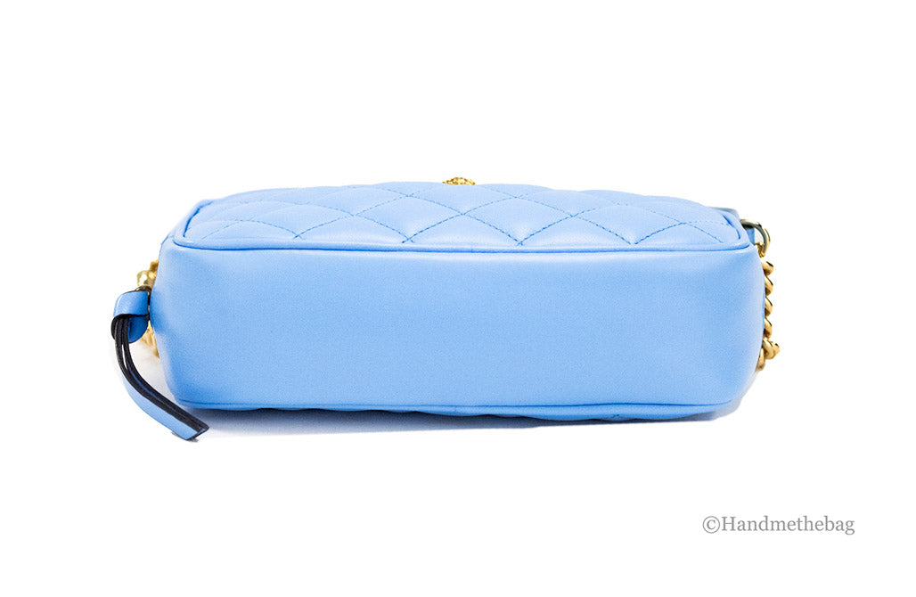 versace dv blue quilted crossbody bottom on white background