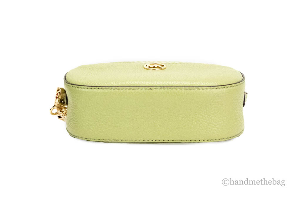 michael kors jet set glam light sage oval crossbody bottom on white background