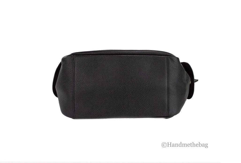coach pennie black shoulder bag bottom on white background 