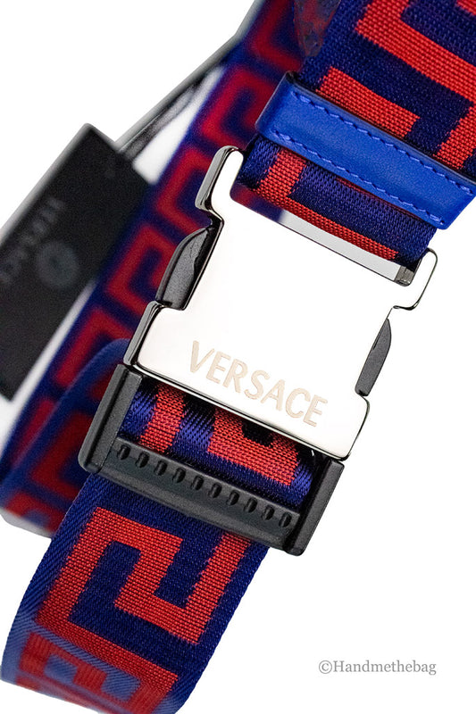 versace greek key belt detail on white background