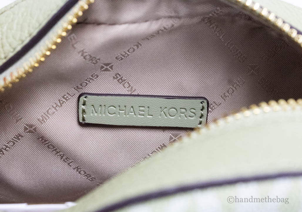 Michael Kors Leather Jet Set Glam Oval Crossbody,Brown: Handbags