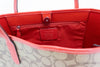 coach wild strawberry city tote inside on white background