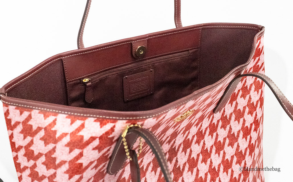 coach pink red houndstooth city tote inside on white background