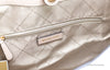 michael kors arlo large buff tomb tote inside on white background