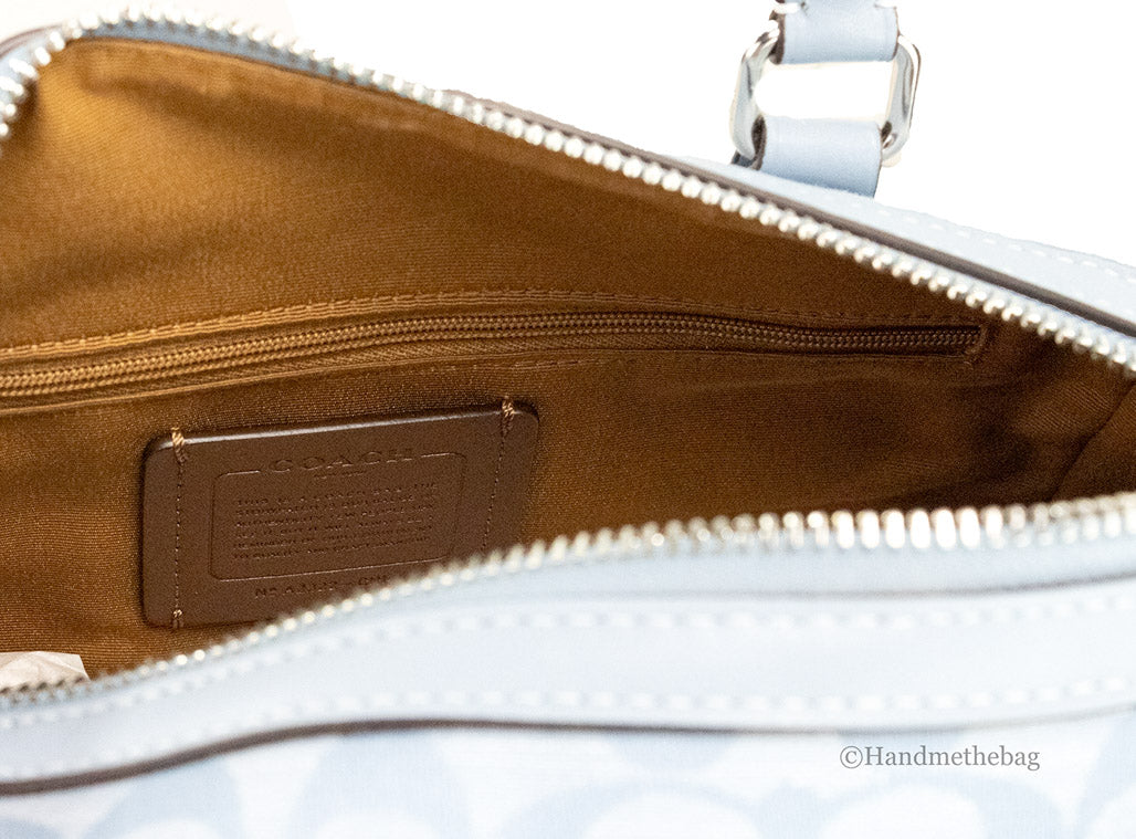 coach rowan cornflower canvas satchel inside on white background