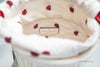 kate spade dottie ladybug cylinder crossbody inside on white background 