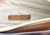 michael kors gabby small vanilla pvc satchel crossbody inside on white background