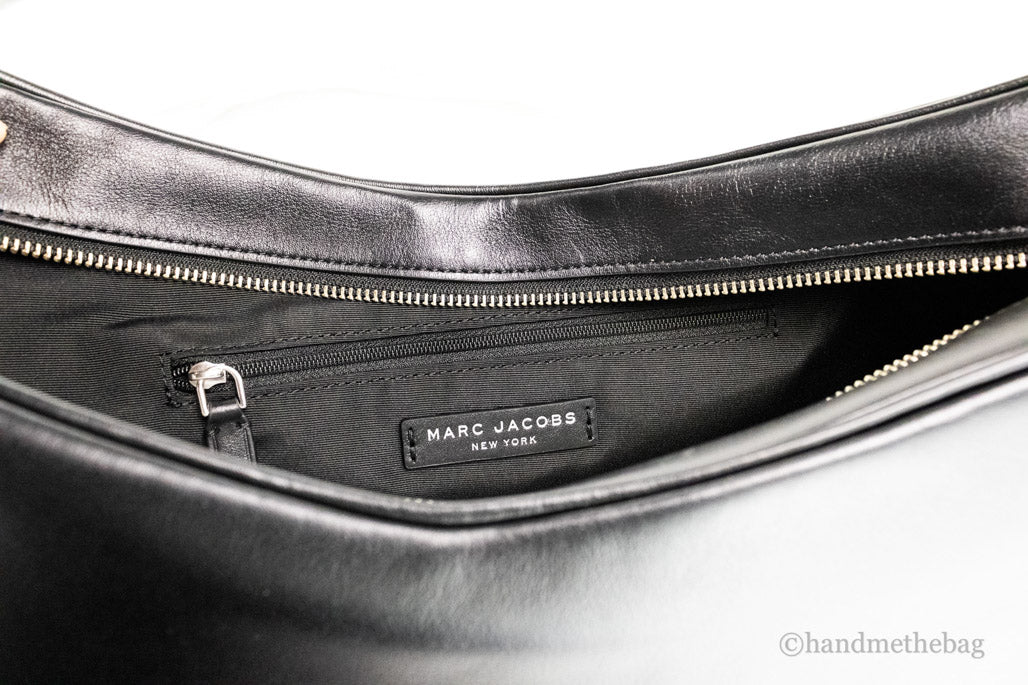 marc jacobs tempo large black convertible bag inside on white background