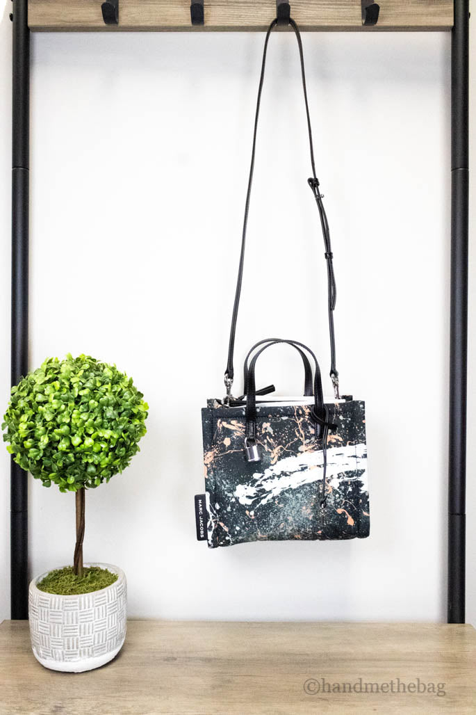 marc jacobs black splatter paint tote hanging
