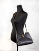 versace virtus small hobo bag on mannequin