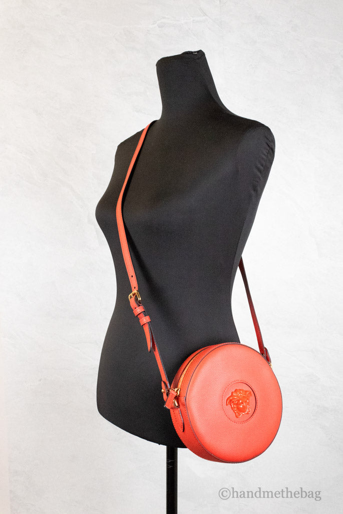 versace disco round red crossbody on mannequin