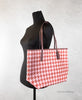 coach pink red houndstooth city tote on mannequin