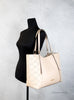 michael kors arlo large buff tomb tote on mannequin