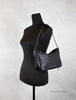 marc jacobs tempo black shoulder bag on mannequin
