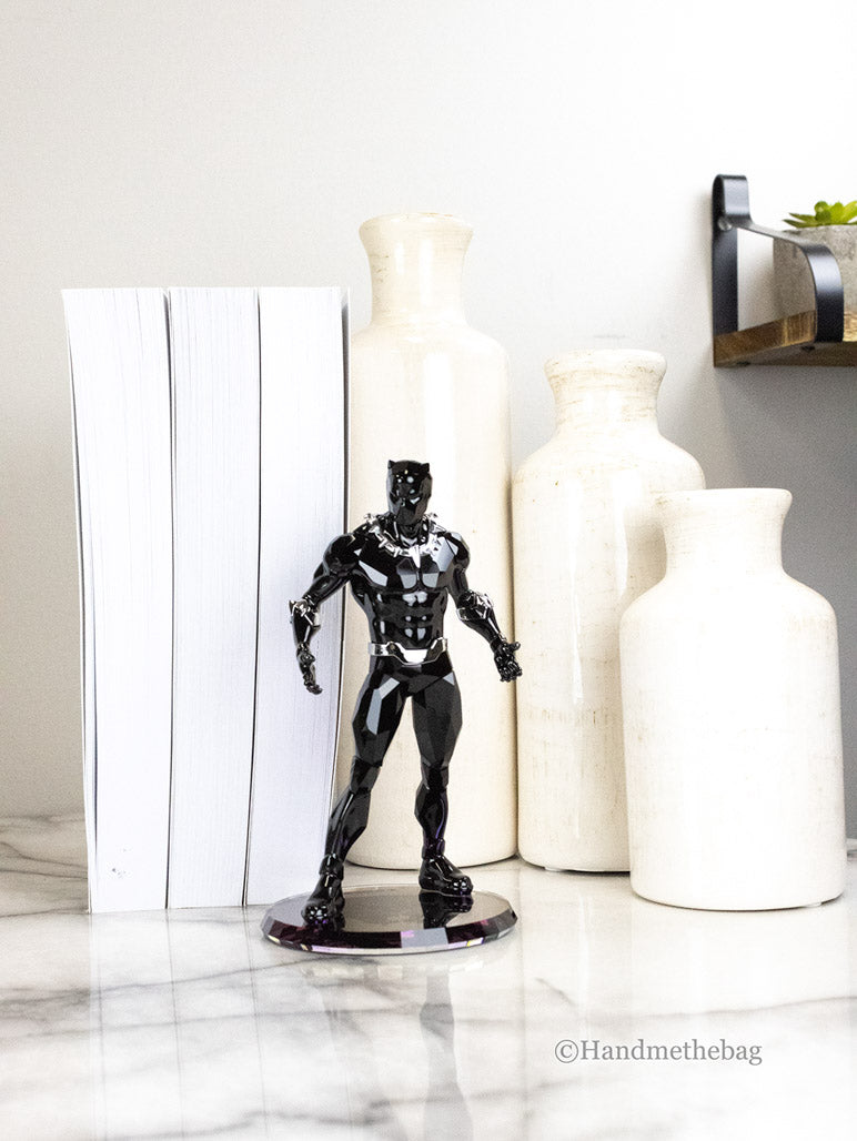 swarovski 5645683 marvel's black panther crystal figurine on marble table