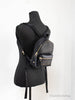 marc jacobs mini black backpack on mannequin