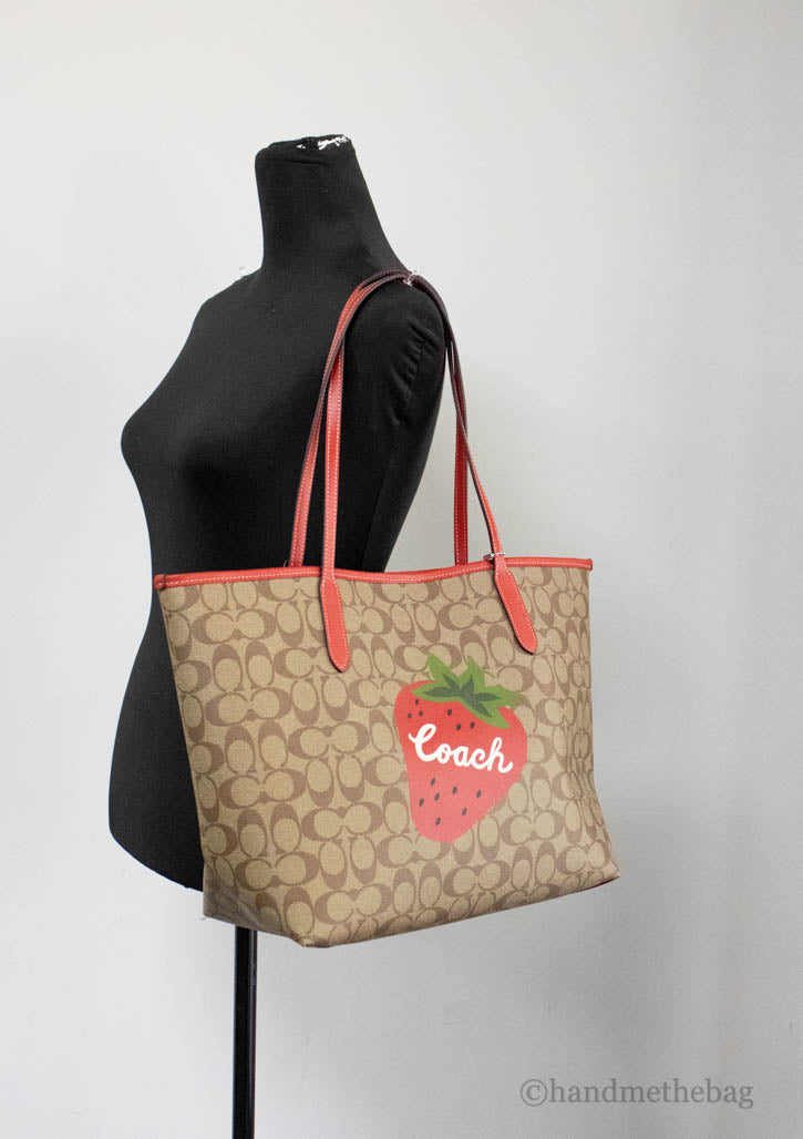 coach wild strawberry city tote on mannequin