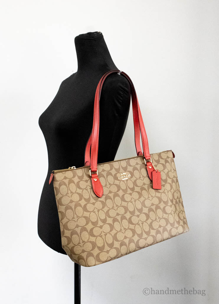 coach khaki electric red gallery tote on mannequin