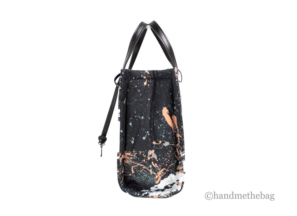 marc jacobs black splatter paint tote side on white background