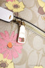 coach rowan floral file crossbody detail on white background
