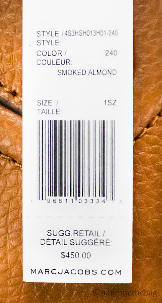 marc jacobs drifter smoked almond hobo bag tag on white background