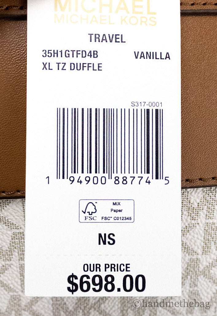 michael kors travel vanilla duffle tag on white background
