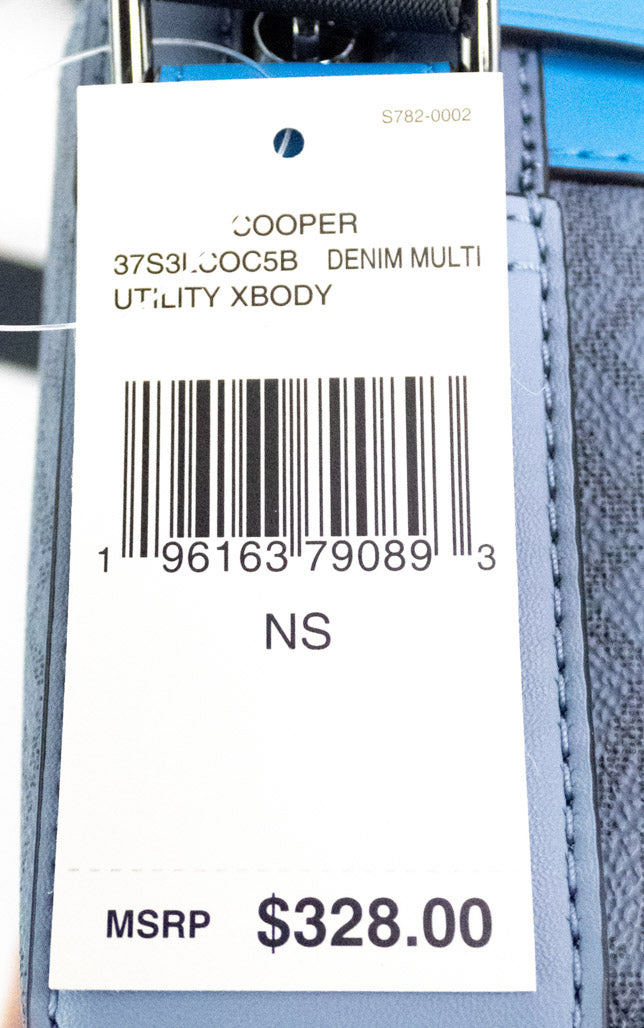 michael kors cooper denim blue utility crossbody tag on white background