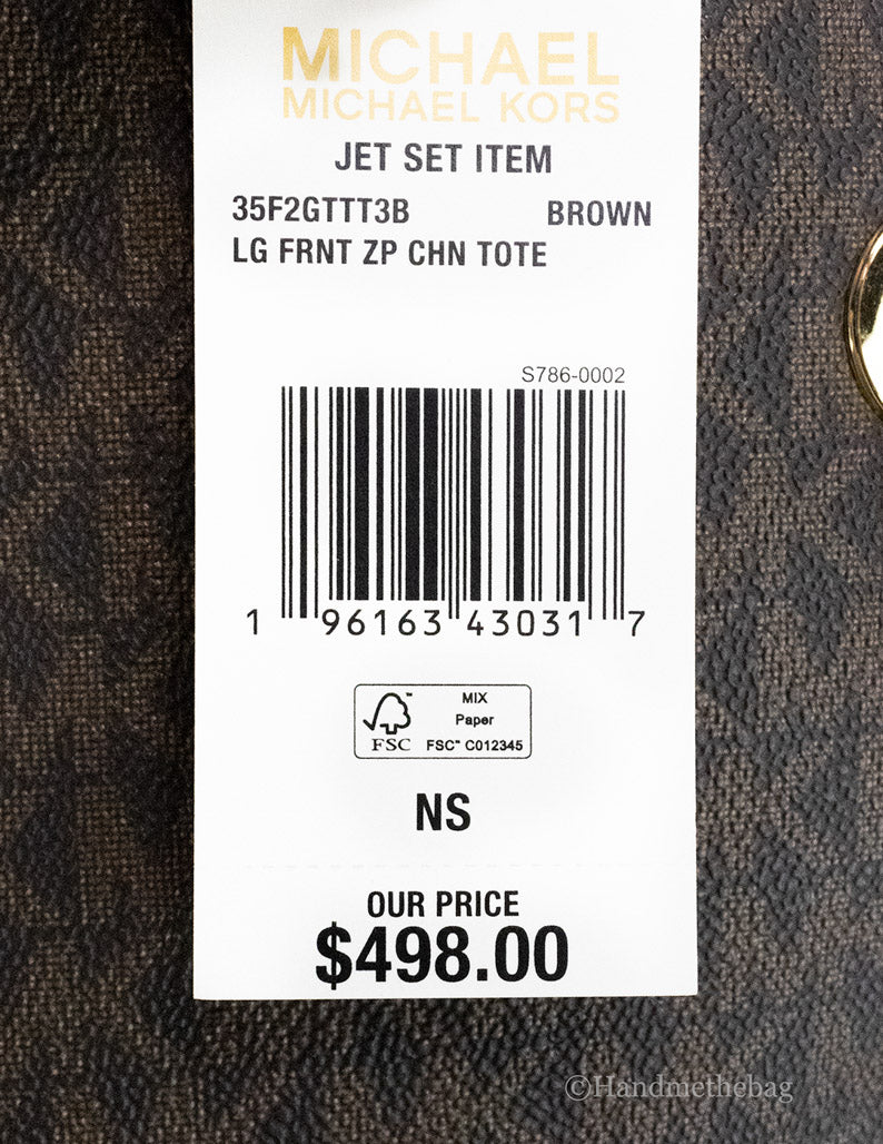 michael kors jet set brown front zip tote tag on white background