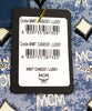 mcm munchen xl blue denim tote tag on white background