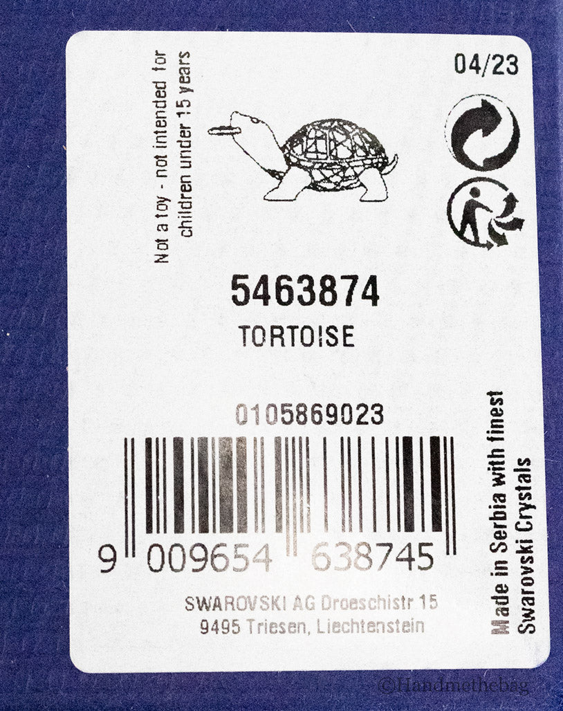 swarovski 5463874 asian symbols tortoise crystal figurine tag on white background