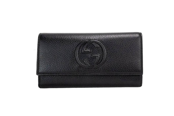 gucci cellarius snap clutch wallet on white background