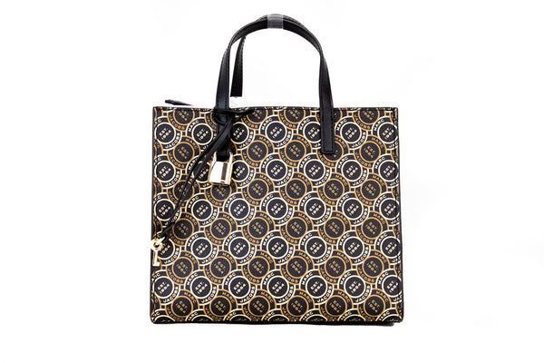 marc jacobs grind signet tote on white background