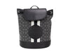 coach dempsey black smoke canvas backpack on white background