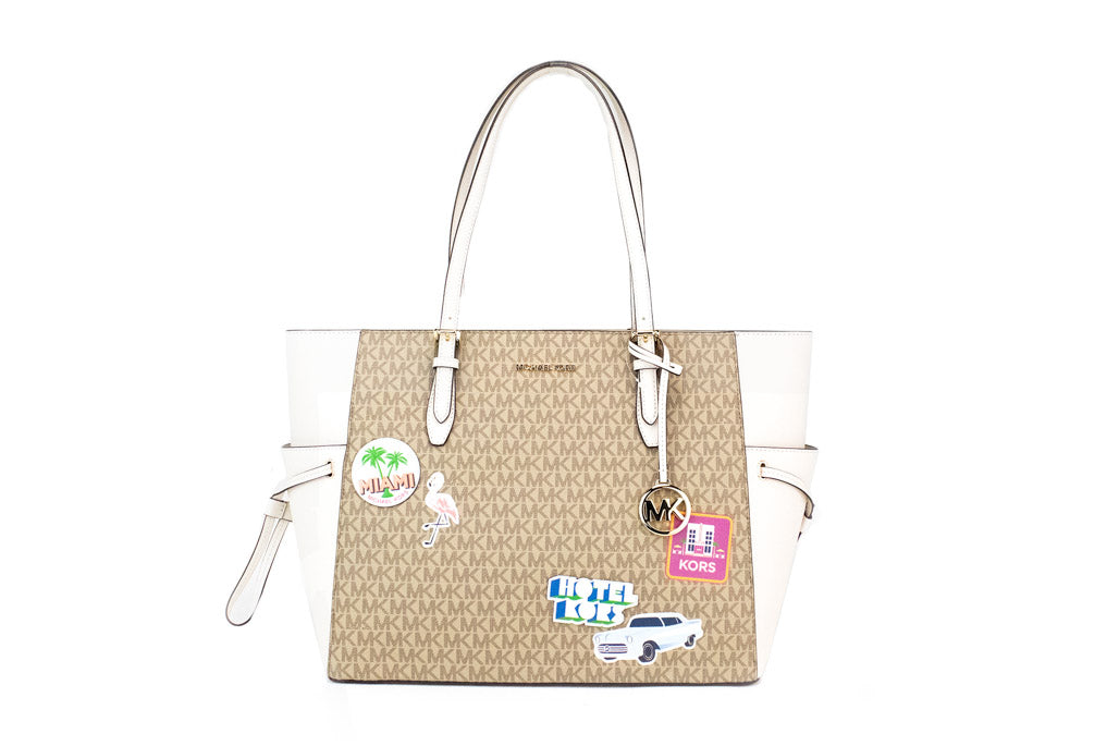 michael kors gilly travel print tote on white background