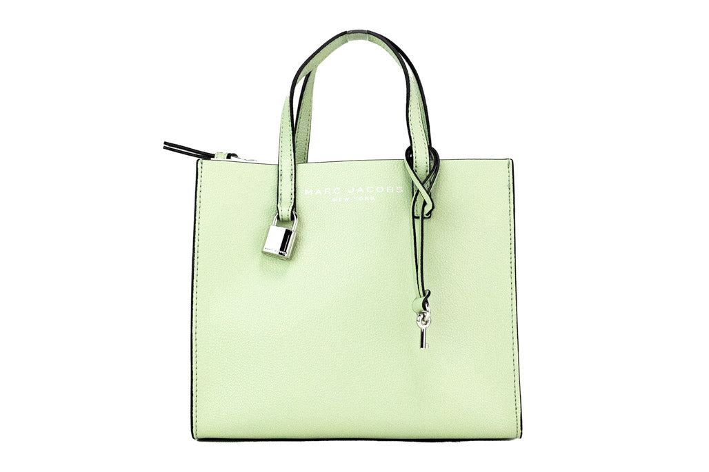 marc jacobs grind mint green tote on white background