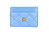 versace mini dv blue quilted card case on white background