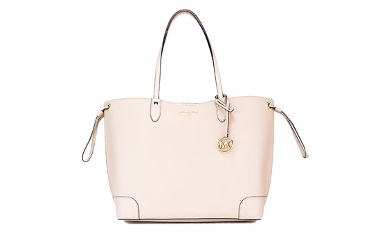 michael kors edith soft pink tote on white background