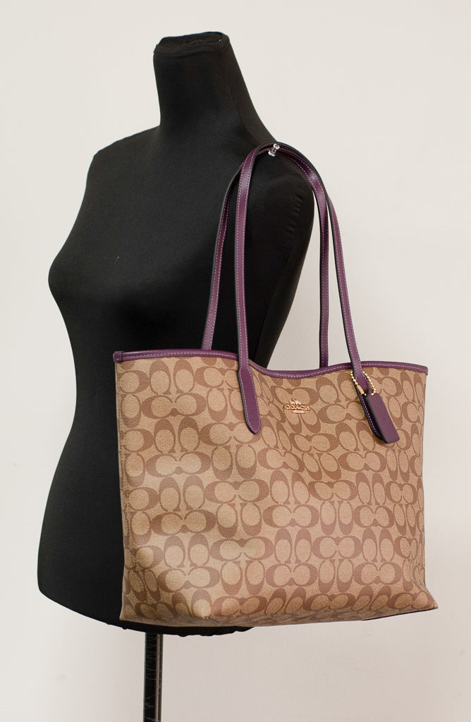 Coach City boysenberry tote on mannequin