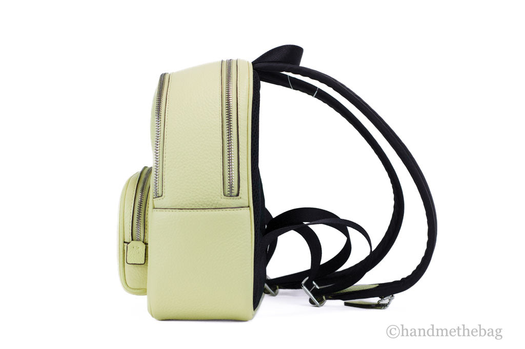 Coach Court pale lime mini backpack side on white background