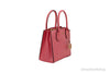 michael kors mercer grapefruit messenger crossbody side on white background
