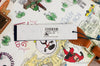 Dooney & Bourke Pixar Maps satchel tag on white background
