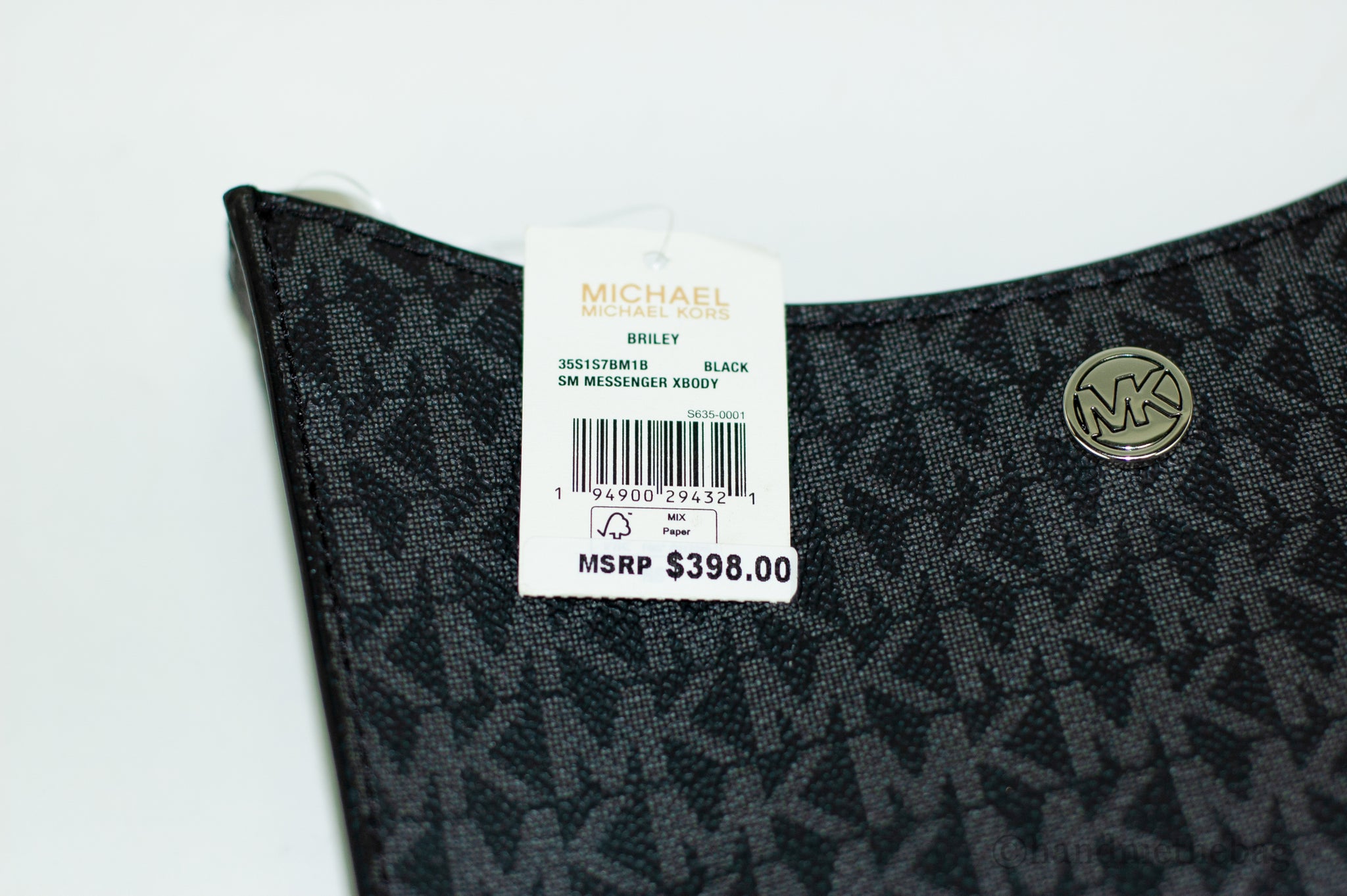 Michael Kors briley black logo crossbody tag on white background